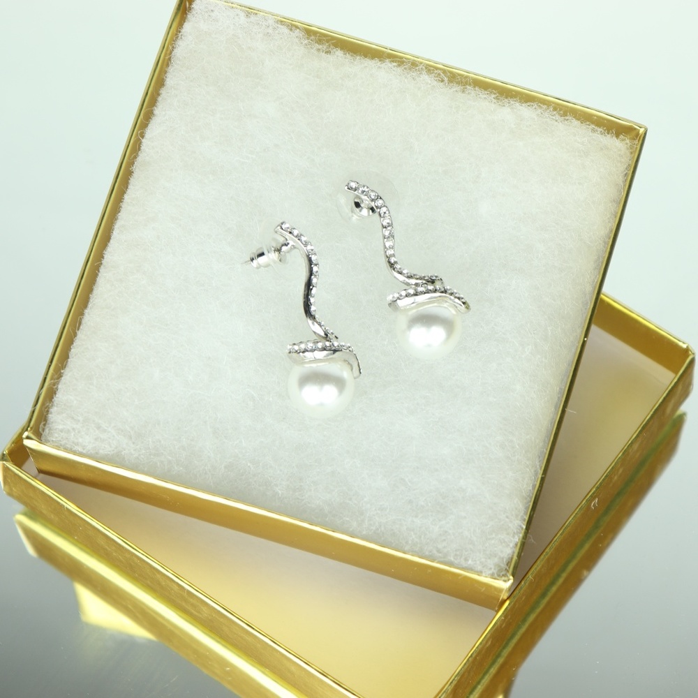 Dangling rhinestone and faux pearl earrings